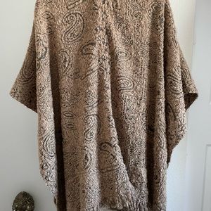 Luxury cape/poncho by Chicos. Beautiful woven and textured fabric.